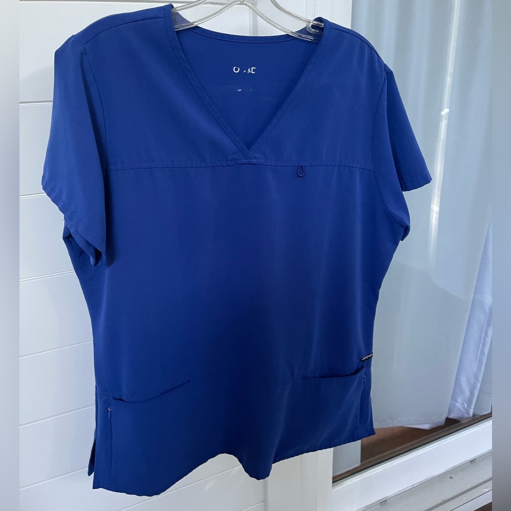 Jockey Women's L Royal Blue V-Neck scrub top. Stretchy and wrinkle free